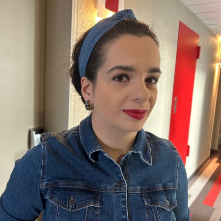 Denim all over with red accents.